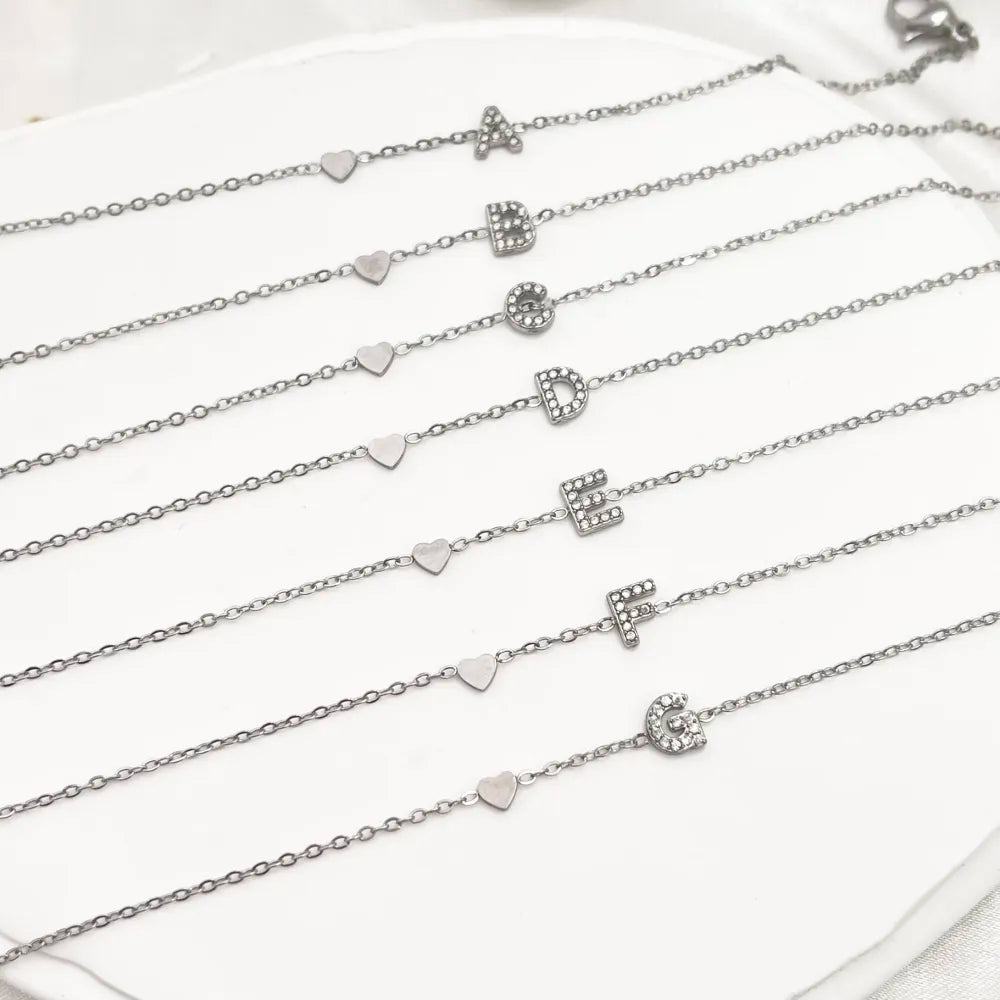 Bracciali letterine cuore argento
